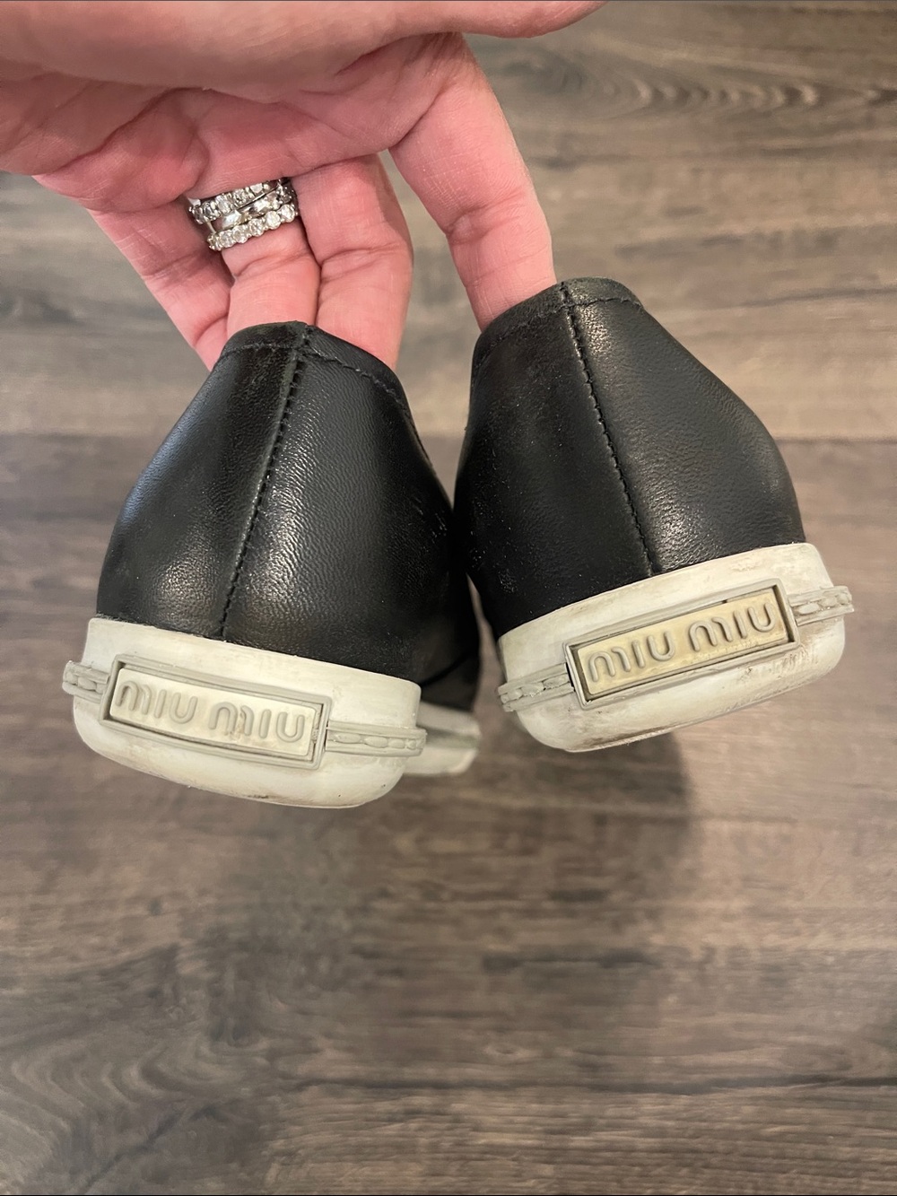 Miu Miu Black Leather Slip-Ons with Silver Cap Toe - Picture 9 of 9